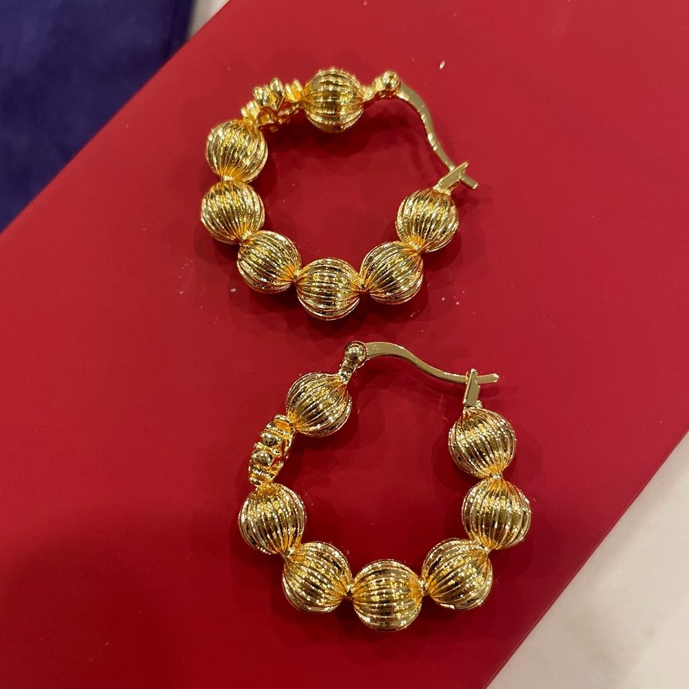 Brand new tory burch hoop earrings in gold
